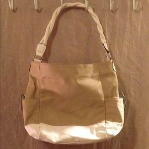 White and tan purse